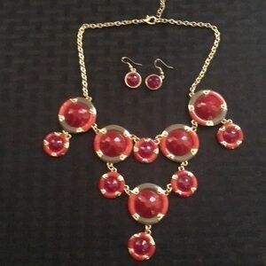 Necklace/earring set.